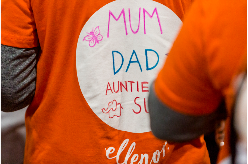 Photo of back to t-shirts with message to say walking in memory of Mum and Dad